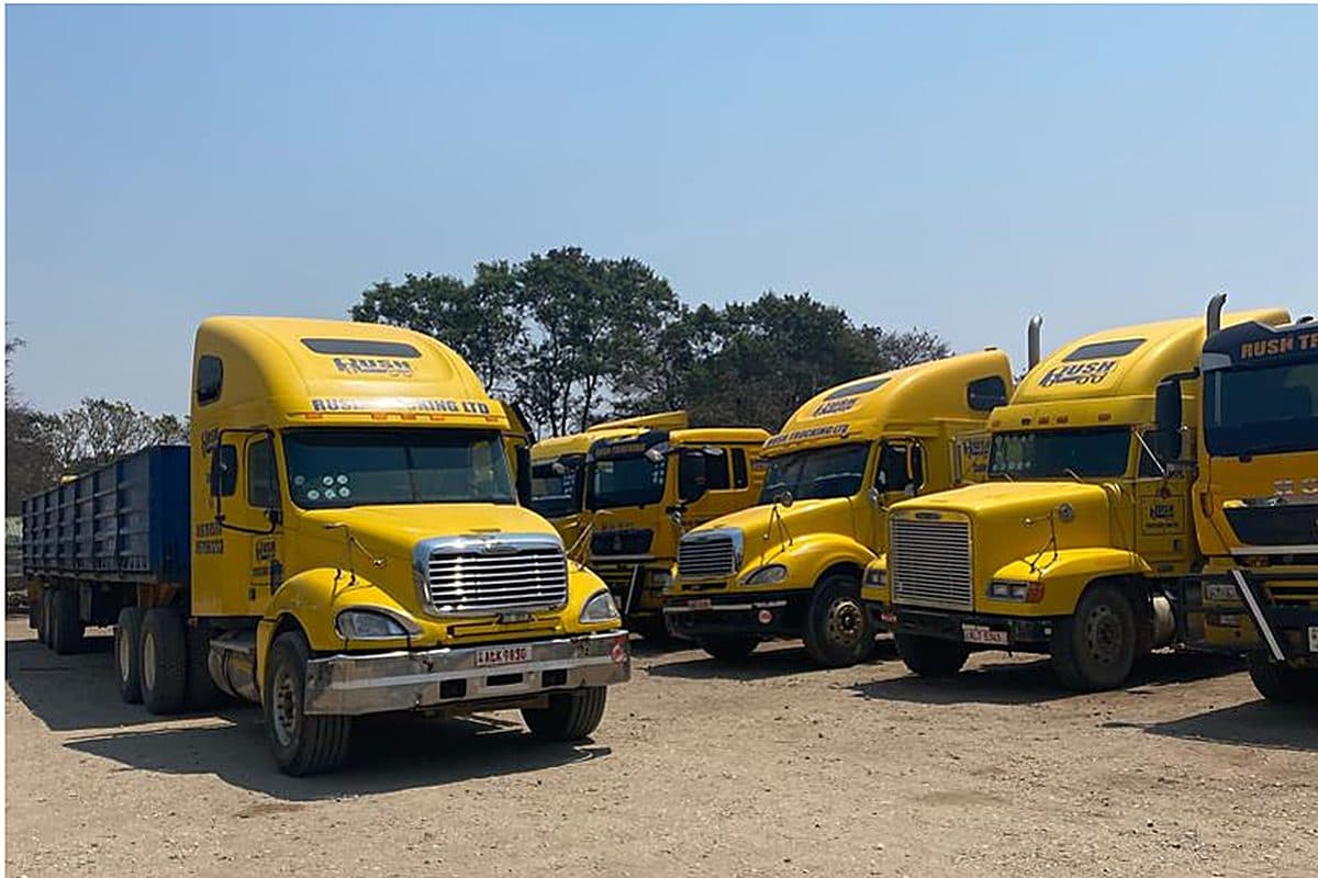 Rush Trucking fleet staged for pre-trip inspection at the yard